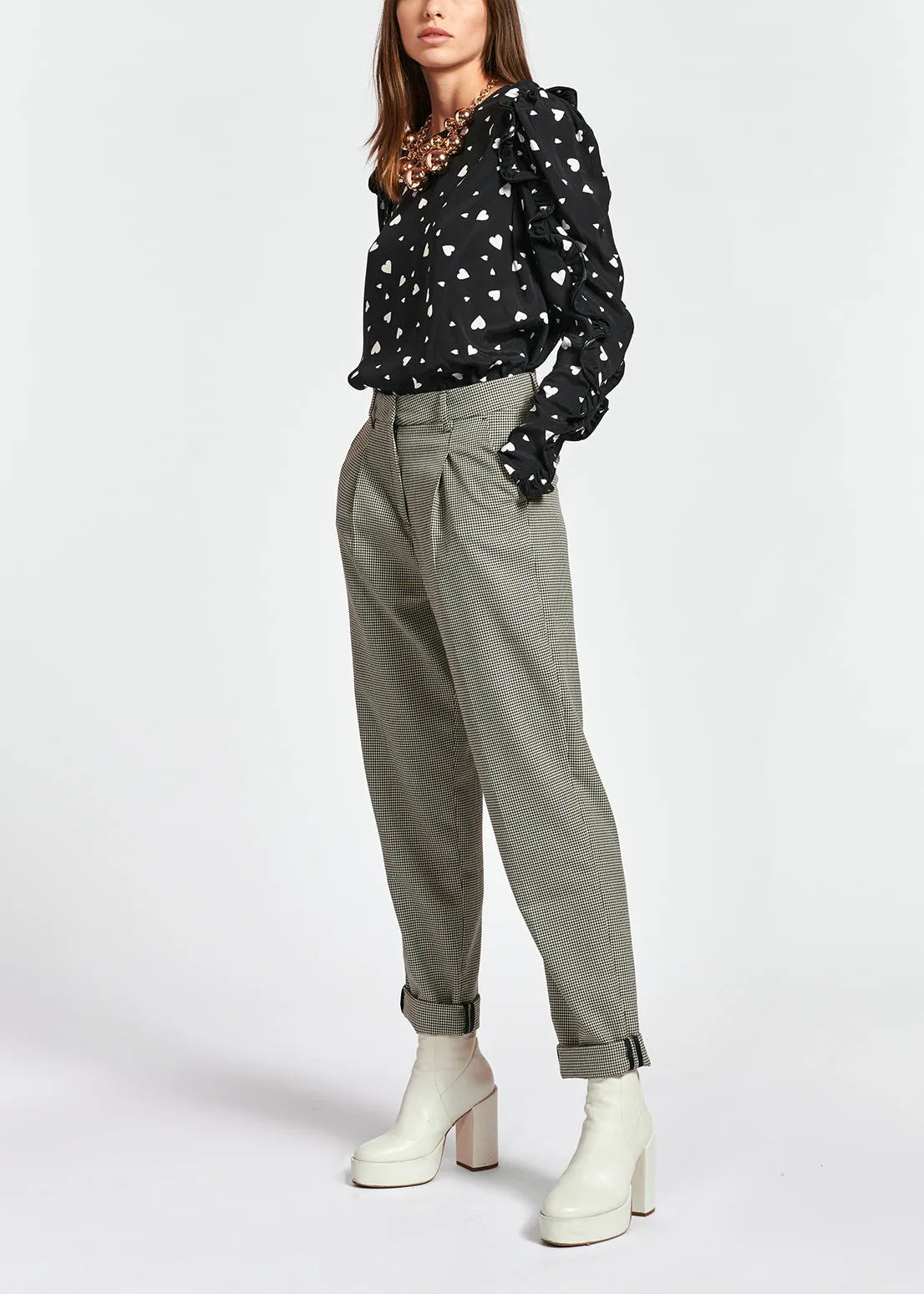 Black heart-print top with ruffled sleeves