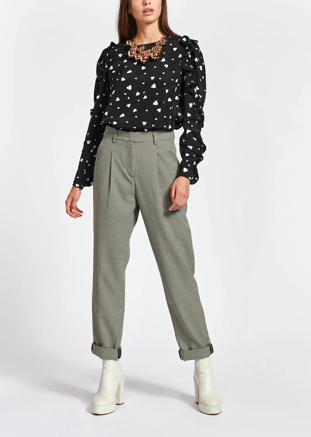 Black heart-print top with ruffled sleeves