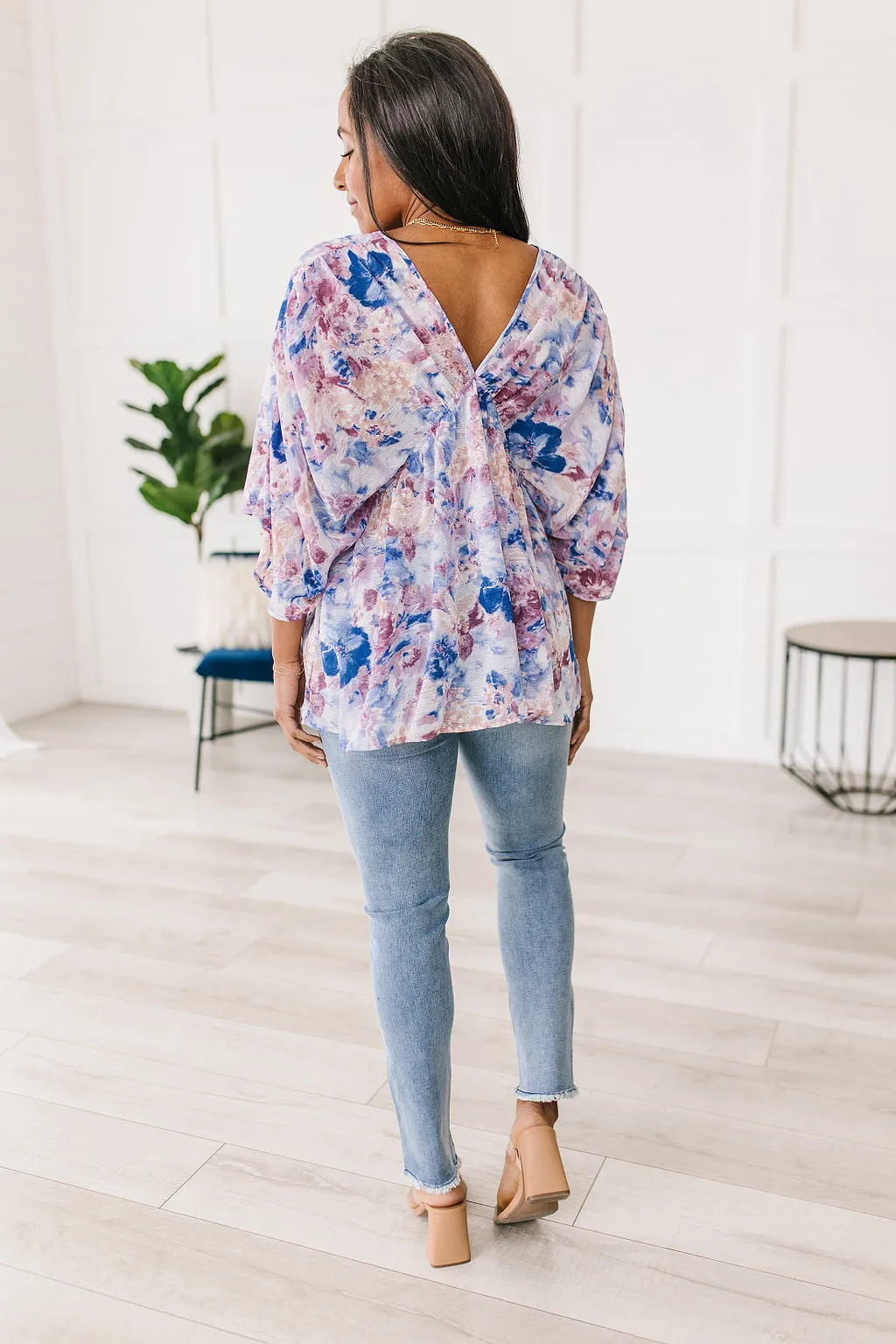 Fabled in Floral Draped Peplum Top in Blue!