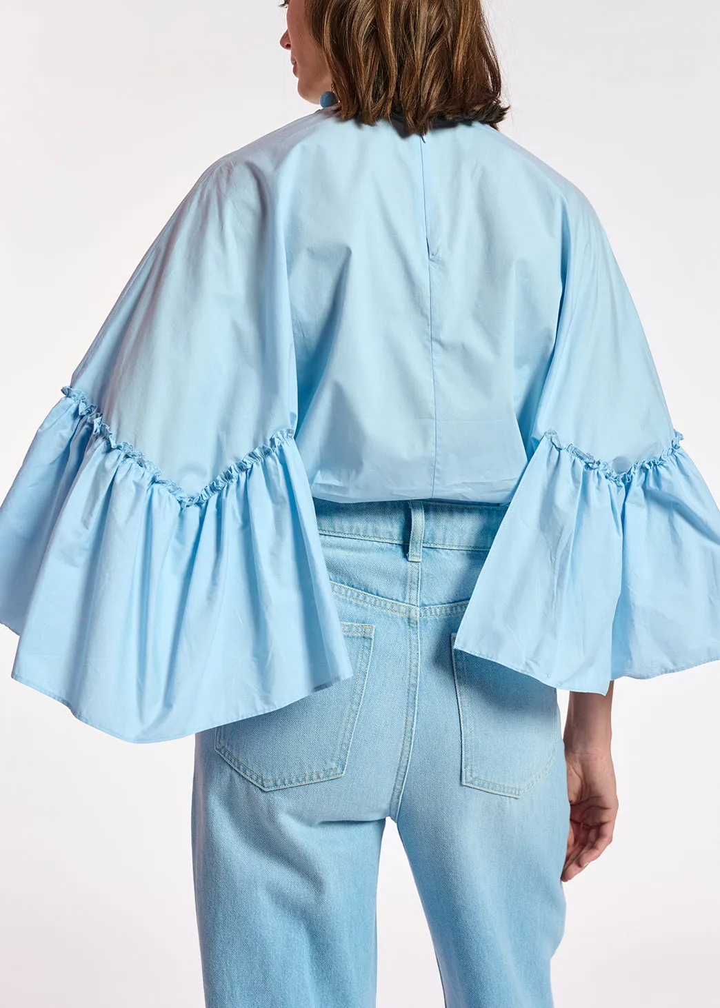 Light blue cotton top with ruffled sleeves