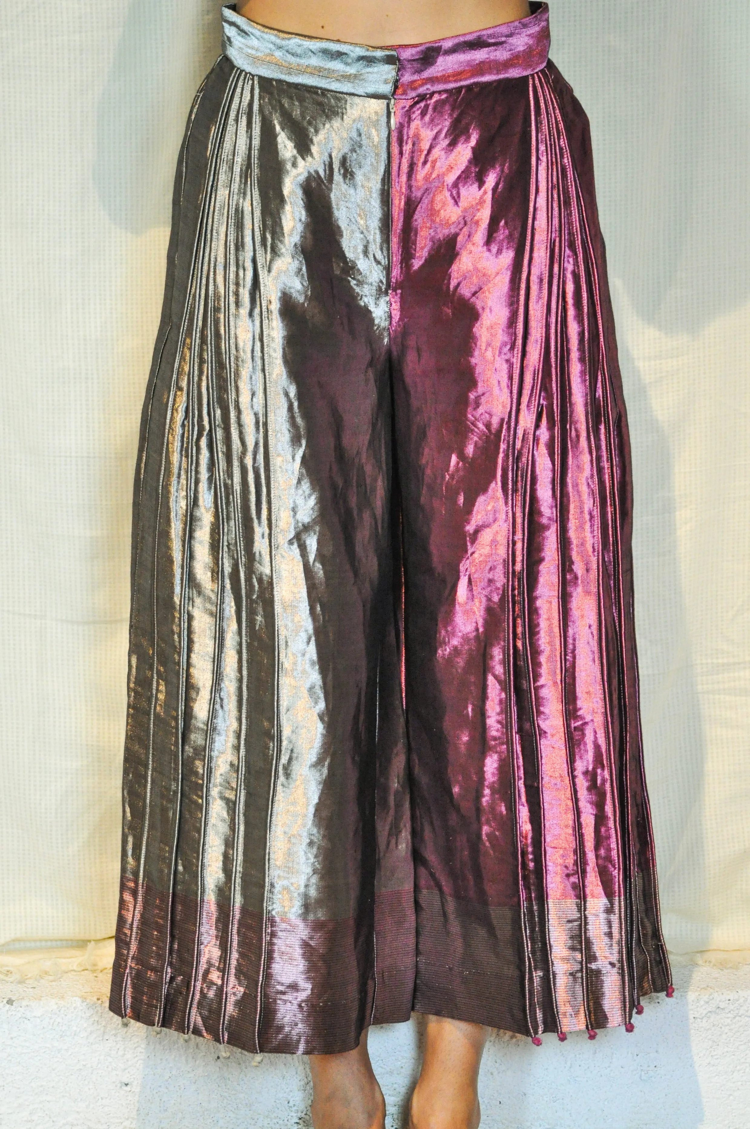Metallic asymmetric flared trousers