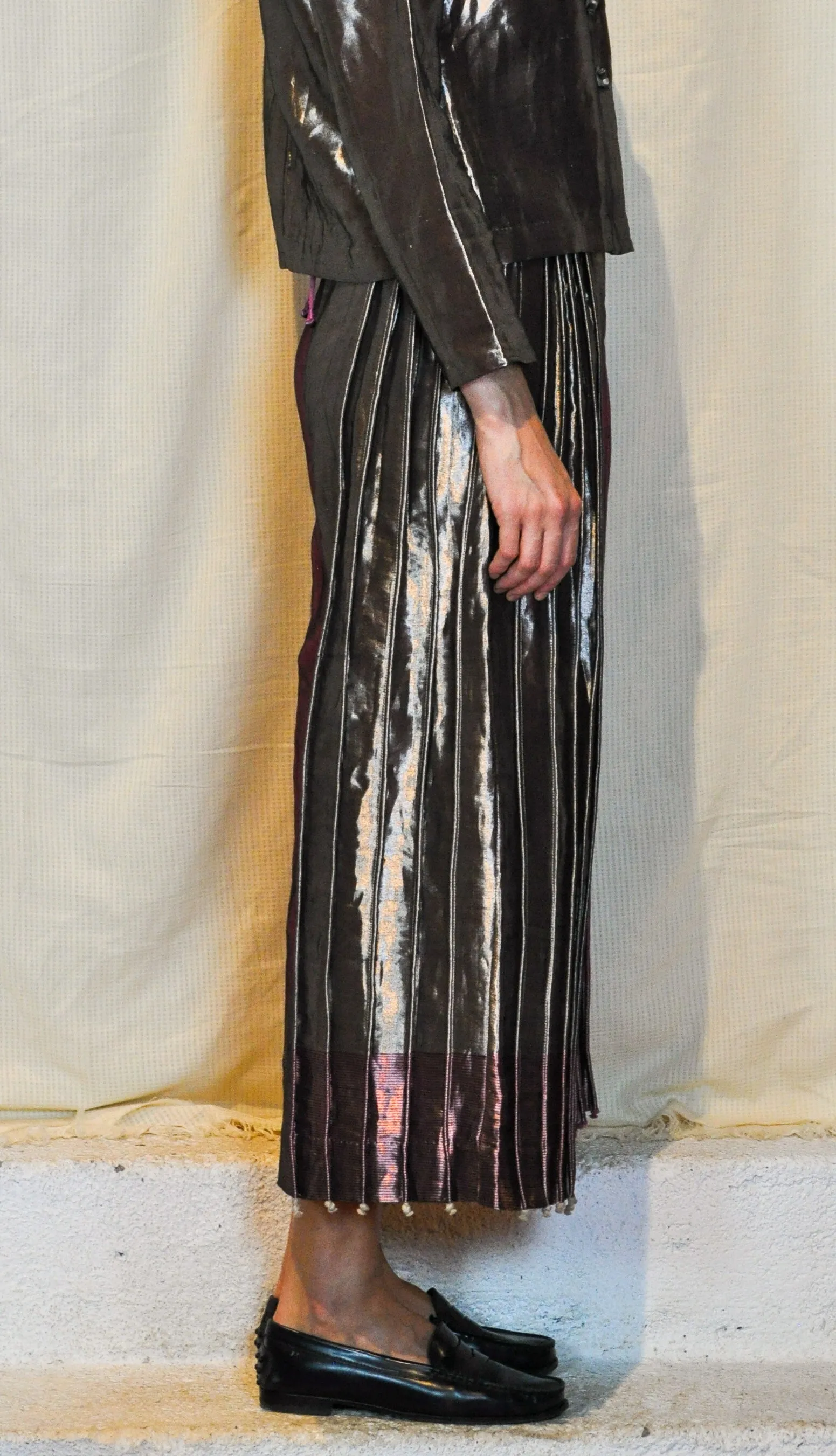 Metallic asymmetric flared trousers