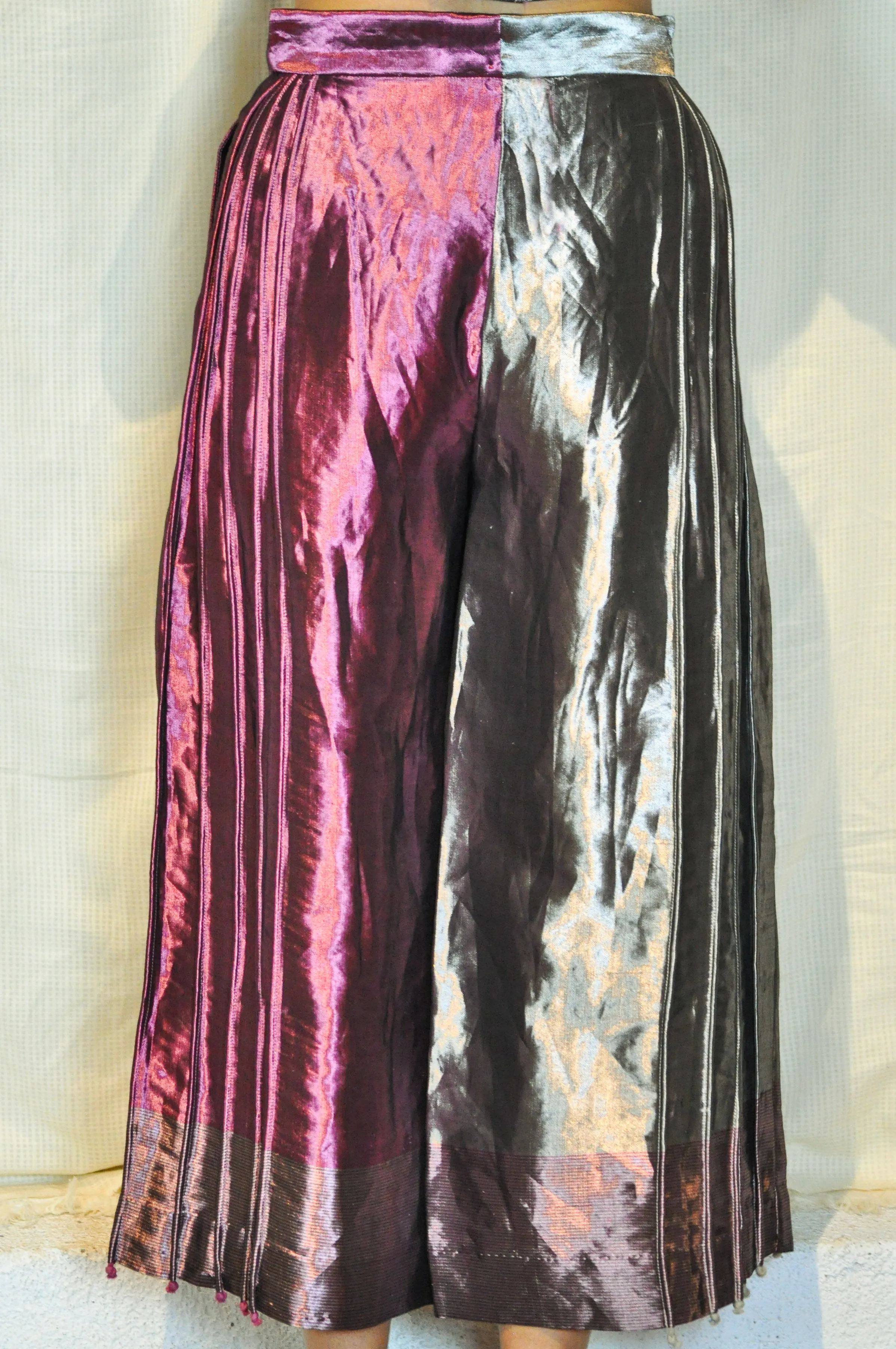 Metallic asymmetric flared trousers