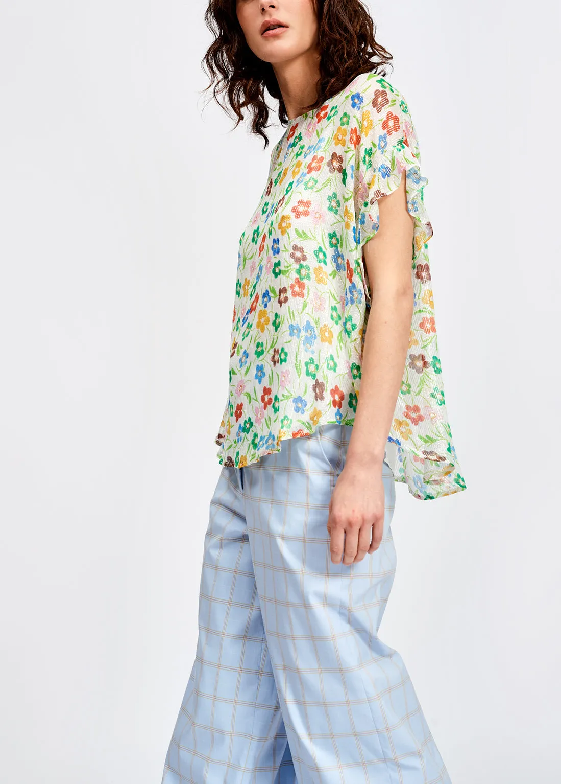 Off-white floral print top with ruffled sleeves