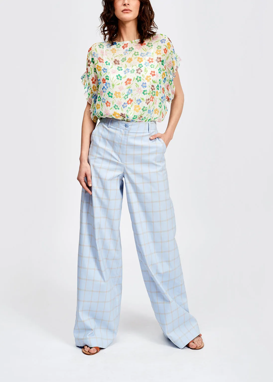 Off-white floral print top with ruffled sleeves