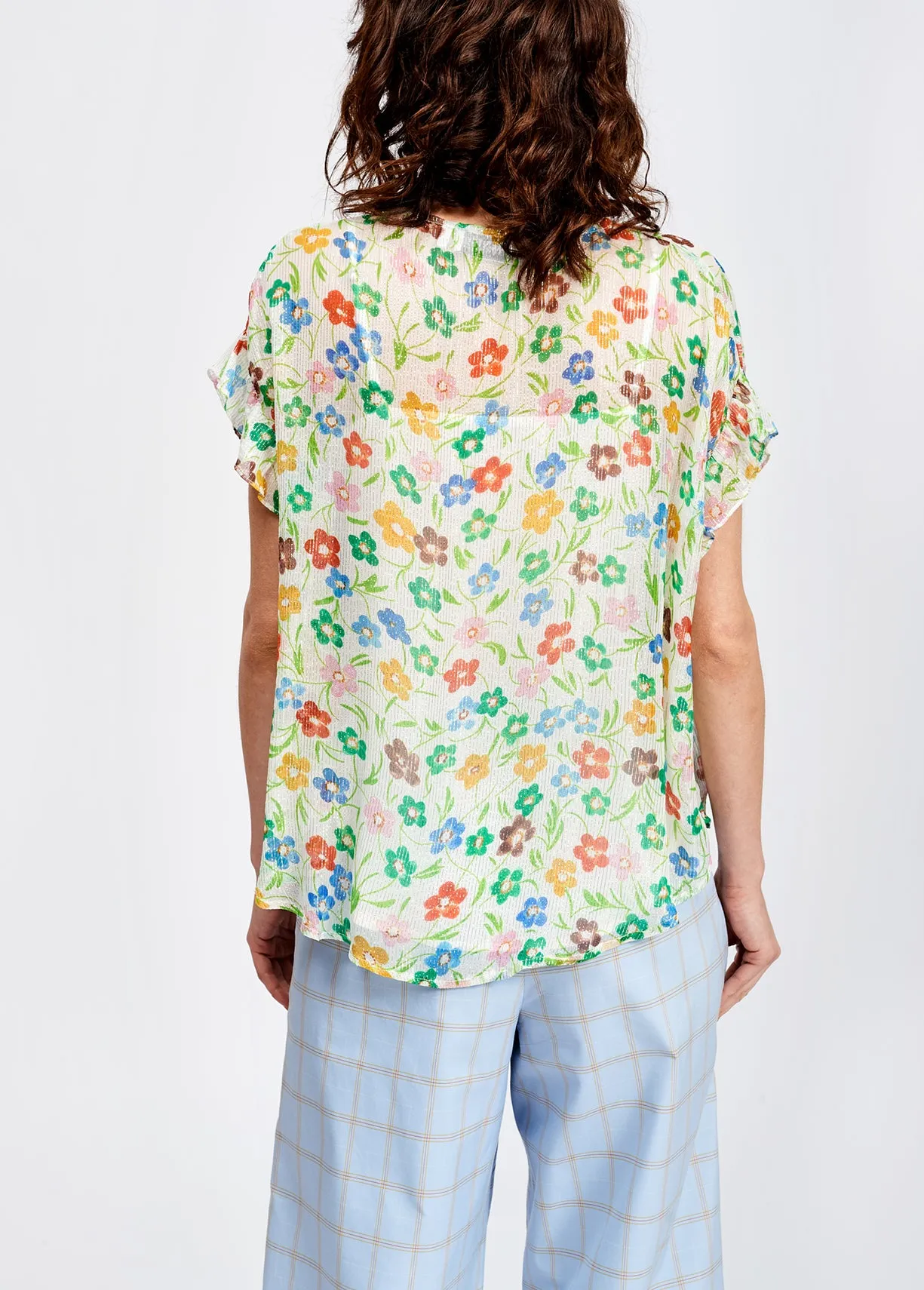 Off-white floral print top with ruffled sleeves