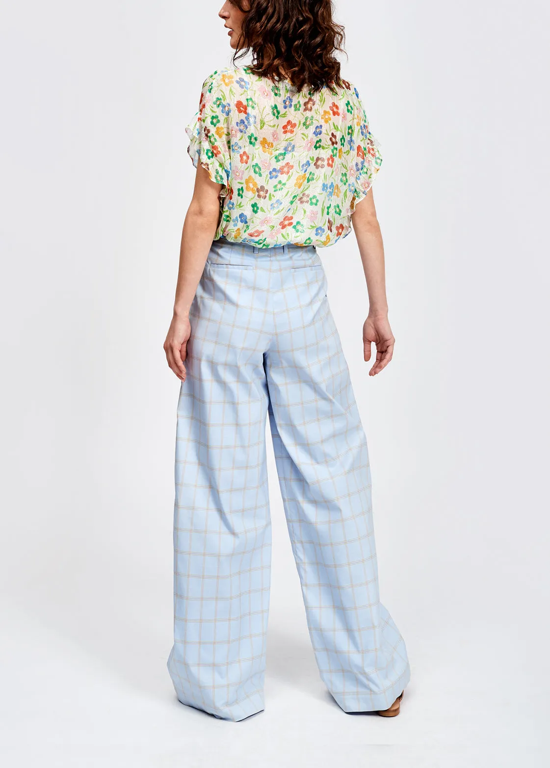 Off-white floral print top with ruffled sleeves