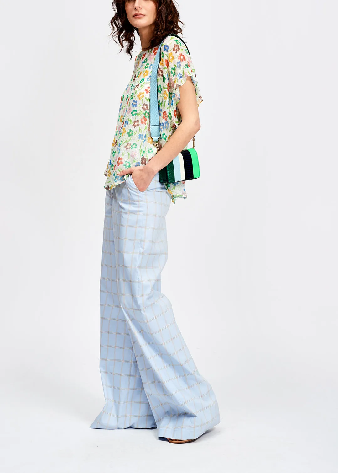 Off-white floral print top with ruffled sleeves