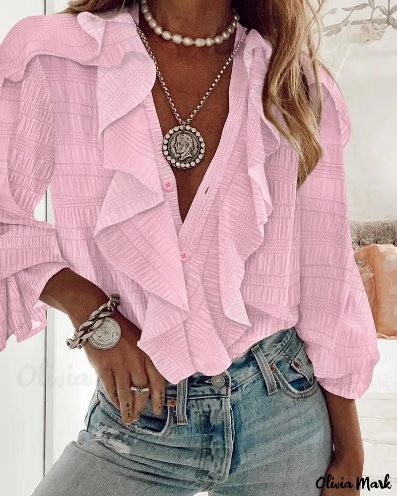 Xieyinshe - Textured Long Sleeve Blouse with Ruffled Hem