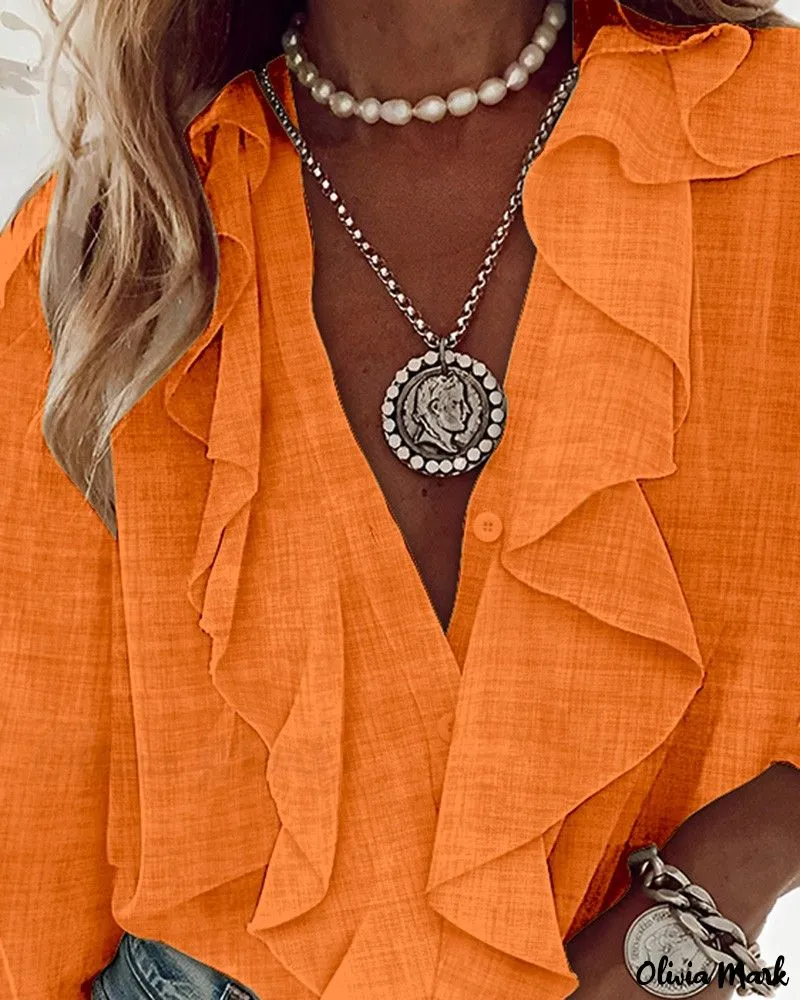 Xieyinshe - Textured Long Sleeve Blouse with Ruffled Hem