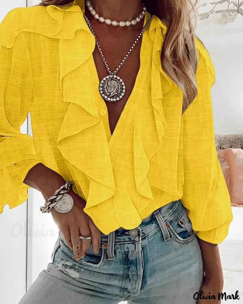 Xieyinshe - Textured Long Sleeve Blouse with Ruffled Hem