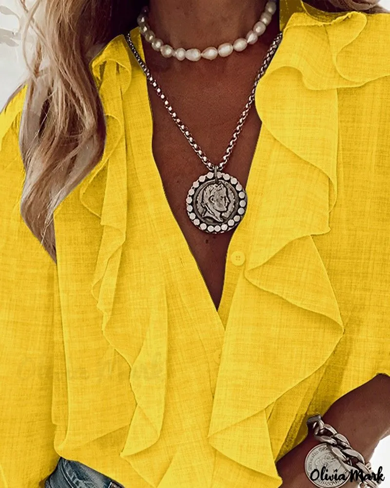 Xieyinshe - Textured Long Sleeve Blouse with Ruffled Hem