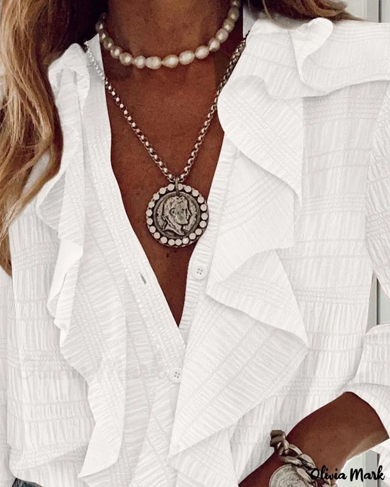 Xieyinshe - Textured Long Sleeve Blouse with Ruffled Hem
